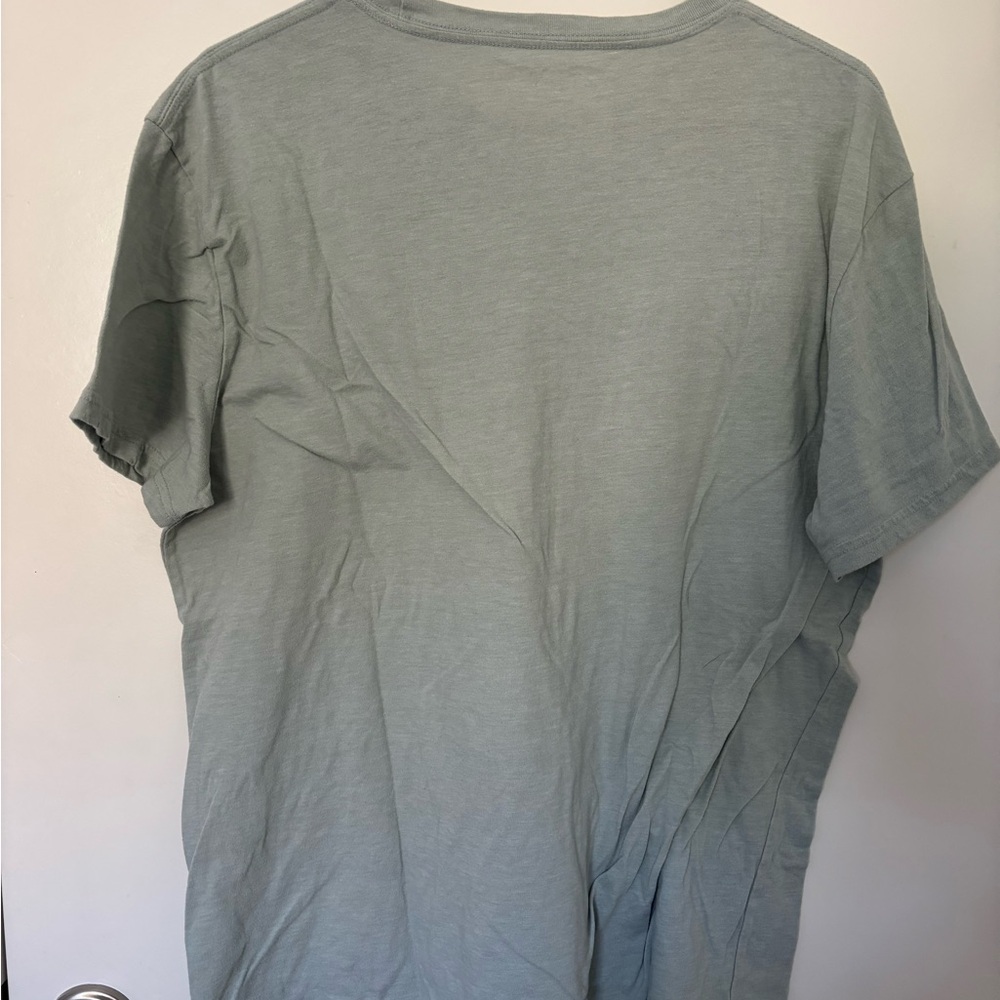 ⭐️ 4 for $20 - Bundle and save!!! ⭐️
Lucky Brand Men's Light Gray Graphic Tee - Picture 2 of 5